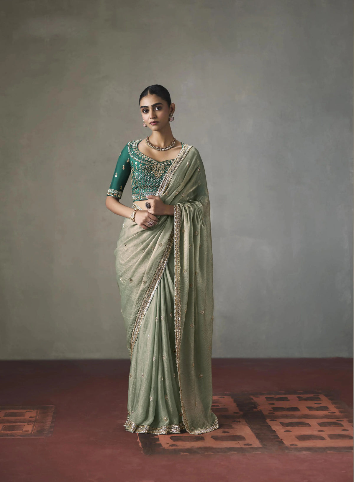 Lightweight Silk Mint Green Party Wear Cutdana Work Sarees