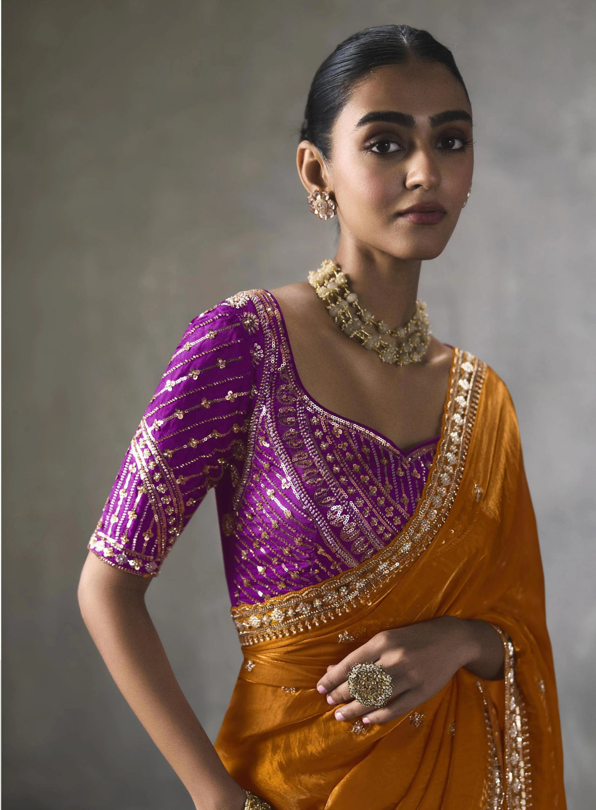 Lightweight Silk Orange Party Wear Cutdana Work Sarees