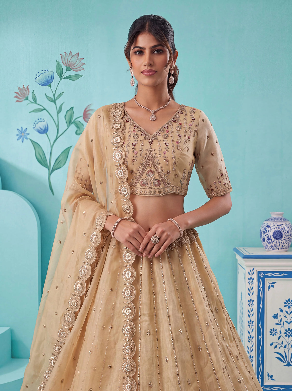 Chandnia Silk Beige Reception Wear Crystal Beads Work Lehengas