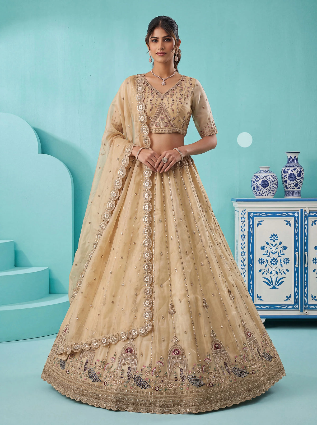 Chandnia Silk Beige Reception Wear Crystal Beads Work Lehengas