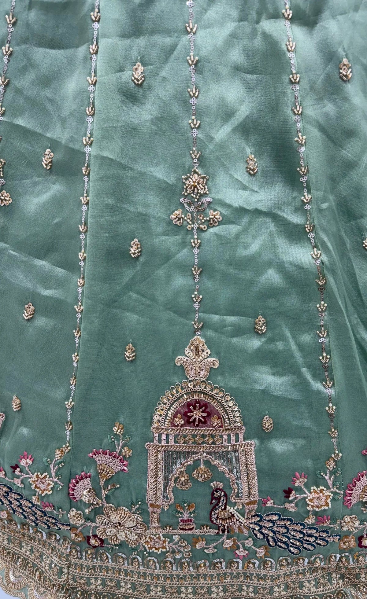 Chandnia Silk Pista Reception Wear Crystal Beads Work Lehengas