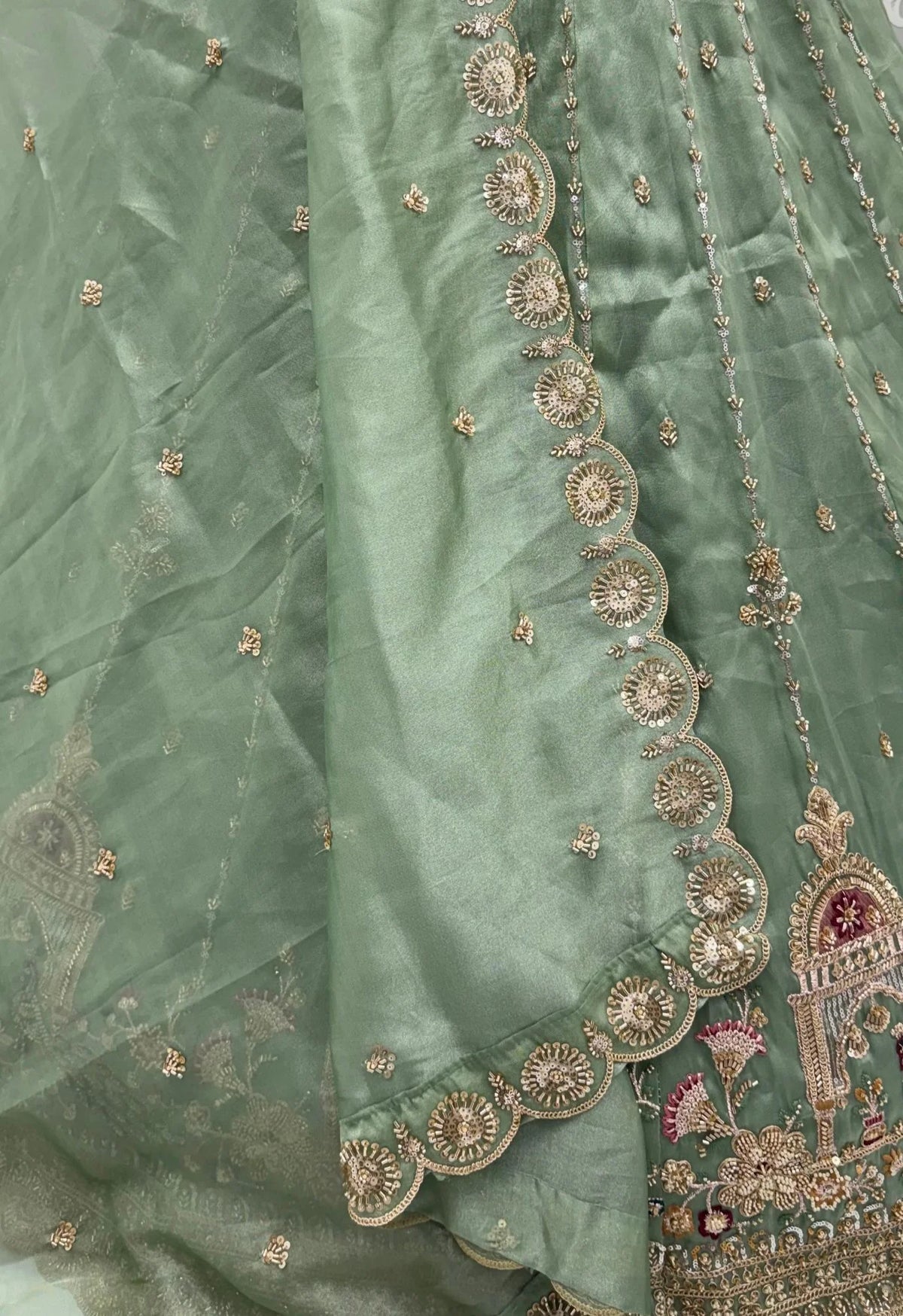 Chandnia Silk Pista Reception Wear Crystal Beads Work Lehengas