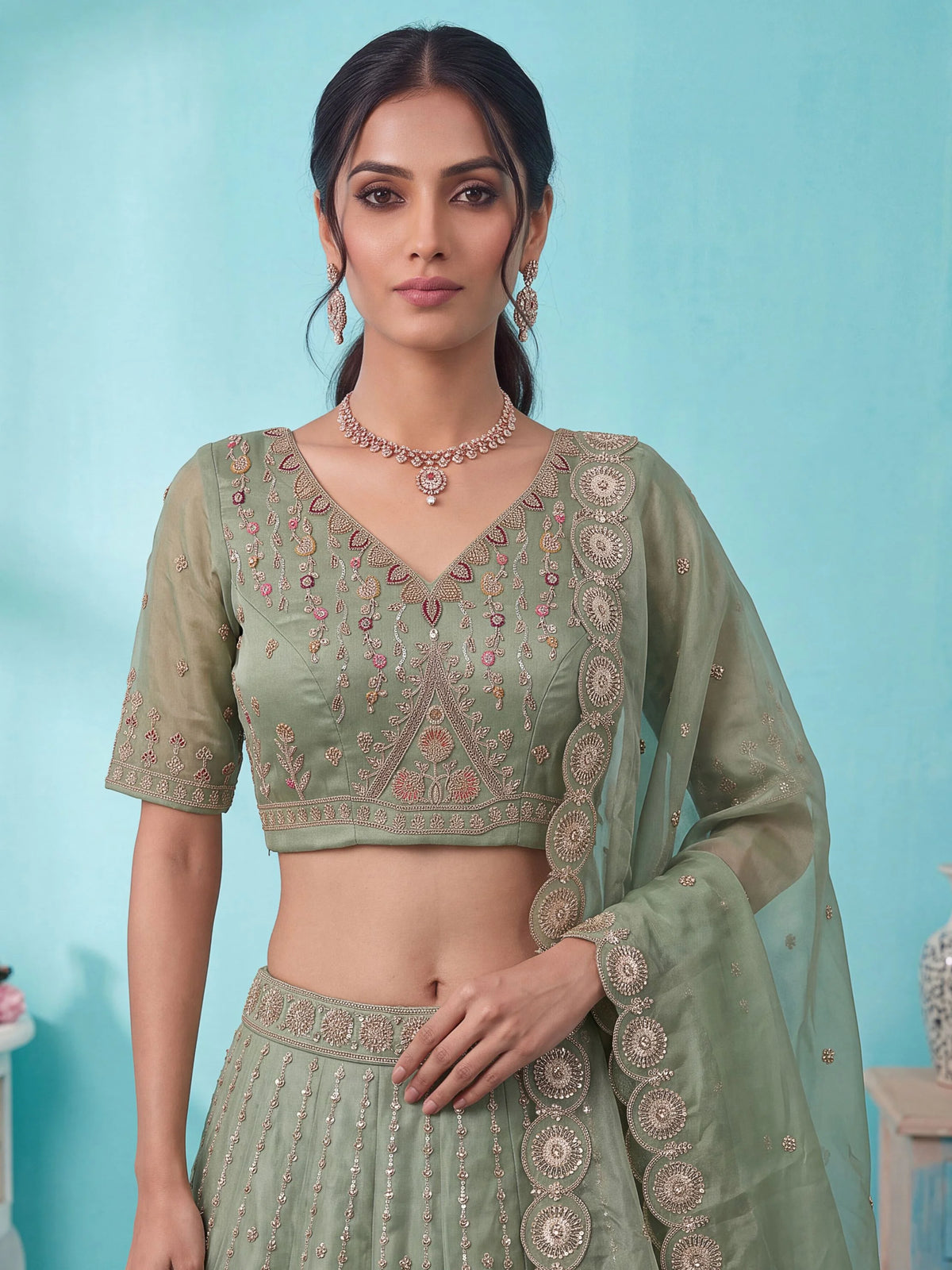 Chandnia Silk Pista Reception Wear Crystal Beads Work Lehengas