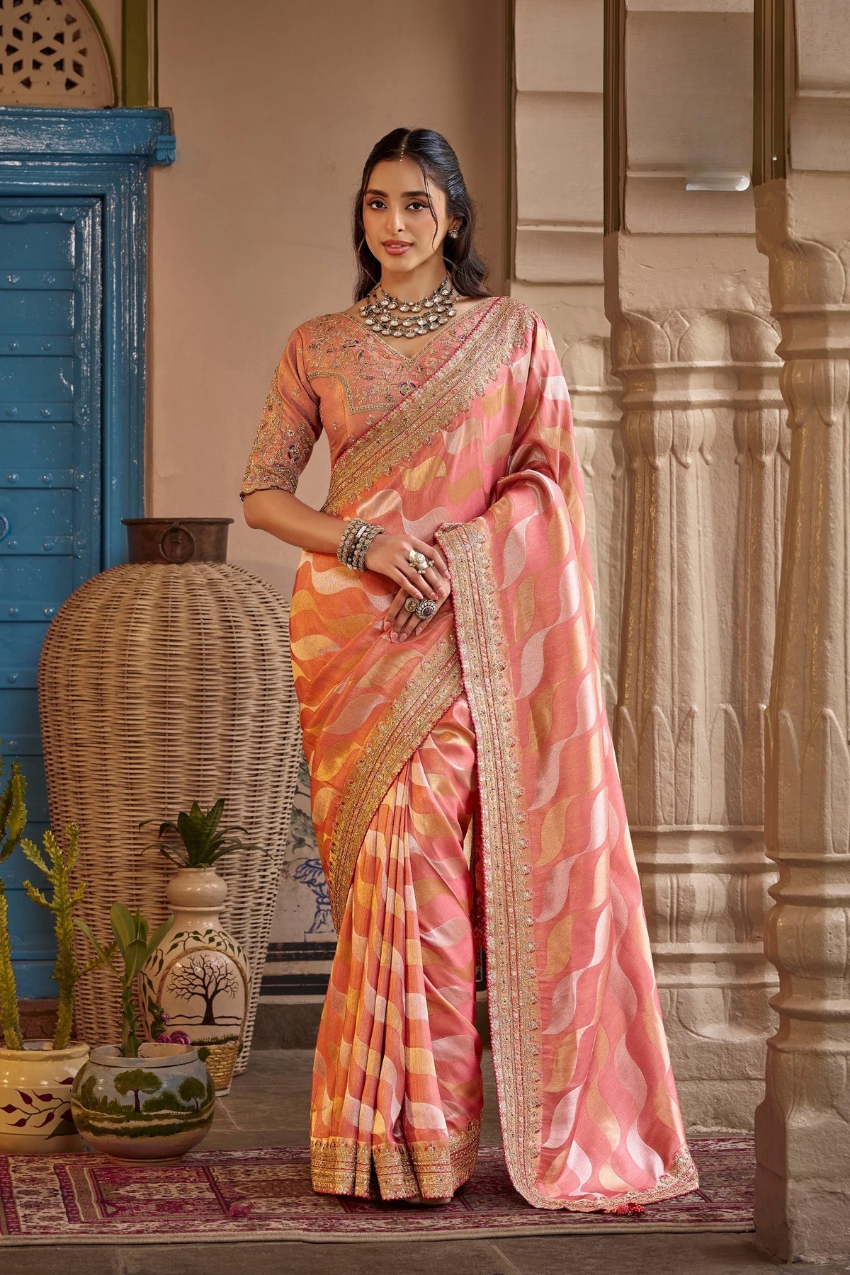 Fancy Based Pure Party Wear Peach With Stitched Blouse Saree